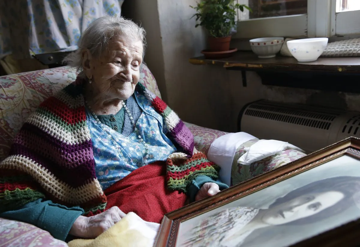 FILE - In this Friday, June 26, 2015 photo, Emma Morano, 116, sits in her apartment in Verbania, Italy. At 116 years of age, Emma is now the oldest person in the world and is believed to be the last surviving person in the world who was born in the 1800s, coming into the world on Nov. 29, 1899. Thats just 4 and a half months after Susannah Mushatt Jones, who died Thursday in New York at the age of 116. (AP Photo/Antonio Calanni, File)