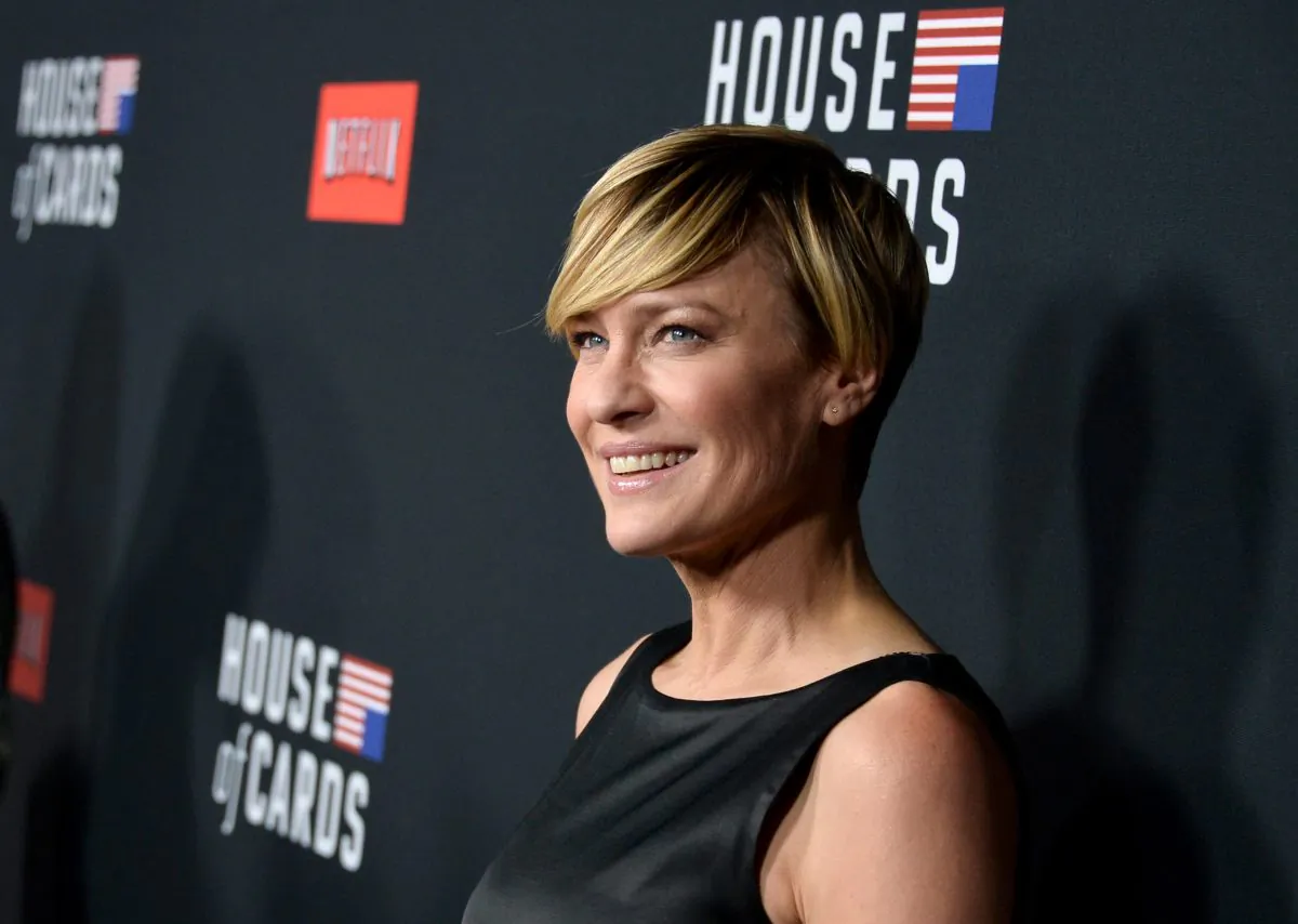 LOS ANGELES, CA - FEBRUARY 13:  Actress Robin Wright arrives at the special screening of Netflix's "House of Cards" Season 2 at the Directors Guild Of America on February 13, 2014 in Los Angeles, California.  (Photo by Kevin Winter/Getty Images)