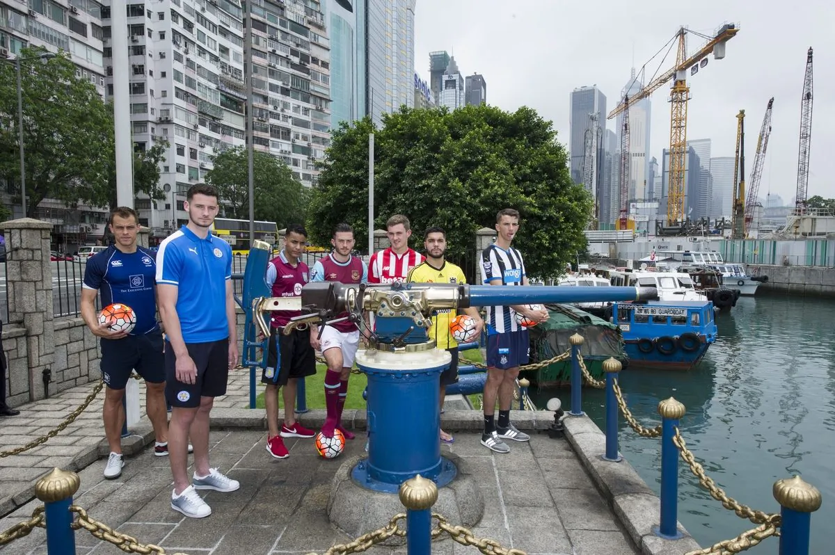 (R-L) Hong Kong Football Club's Gary Gheczy, Leicester City's Elliott Moore, Aston Villa's Khalid Abdo, West Ham United's Lewis Page, Stoke City's Lewis Banks, Wellington Phoenix's Justin Gulley, and Newcastle United's Dan Barlaser at the Noon Day Gun, Causeway Bay on May 19, 2016. (Lucas Schifres/Power Sport Images)
