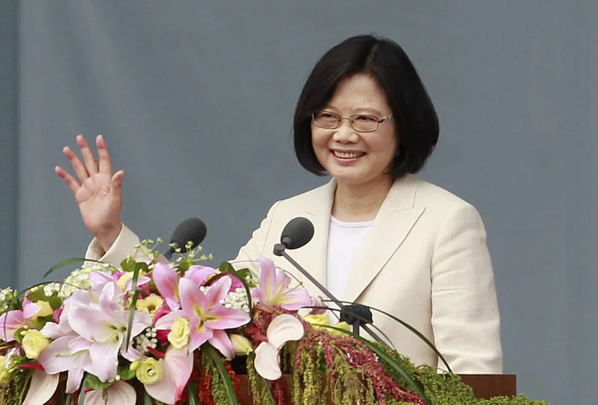 Taiwan's President Tsai Ing-wen waves to Taiwanese people as she delivers an acceptance speech during her inauguration ceremony in Taipei, Taiwan on May 20, 2016. (AP Photo/Chiang Ying-ying)