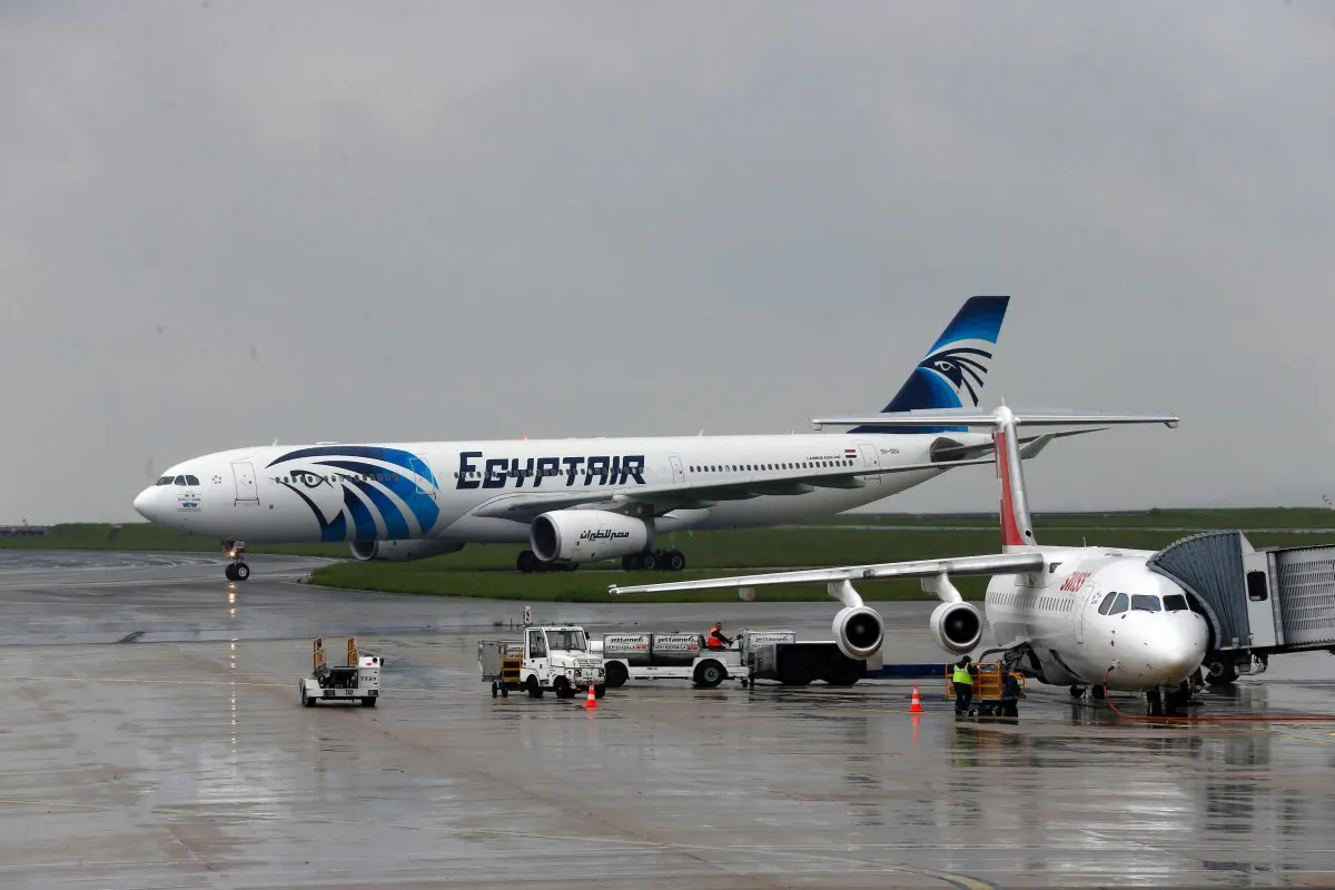 An Egyptair Airbus A330 (L) from Cairo taxiing at the Roissy-Charles De Gaulle airport near Paris after its landing a few hours after the MS804 Egyptair flight went missing. (Thomas Samson/AFP/Getty Images)