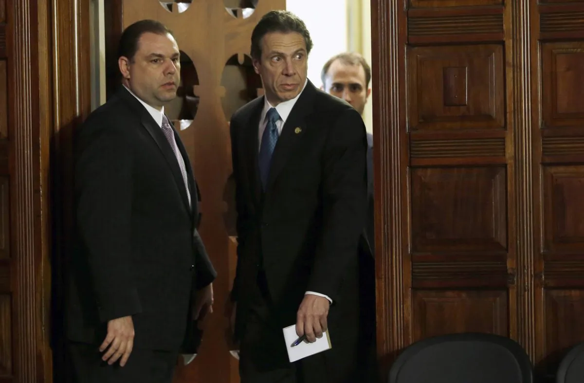 New York Gov. Andrew Cuomo (R) and Joseph Percoco, executive deputy secretary, stand at a news conference in Albany, N.Y., on April 26, 2013. (Mike Groll, File/AP Photo)