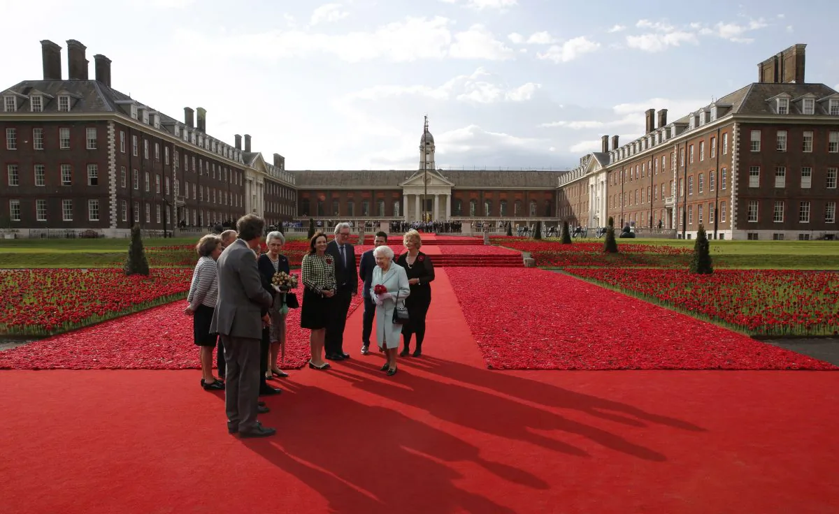 LONDON, ENGLAND - MAY 23:  Queen Elizabeth II visits the 5000 Poppies Garden at Chelsea Flower Show press day at Royal Hospital Chelsea on May 23, 2016 in London, England. The show, which has run annually since 1913 in the grounds of the Royal Hospital Chelsea, is open to the public from 24-28 May.  (Photo by Adrian Dennis - WP Pool/Getty Images)