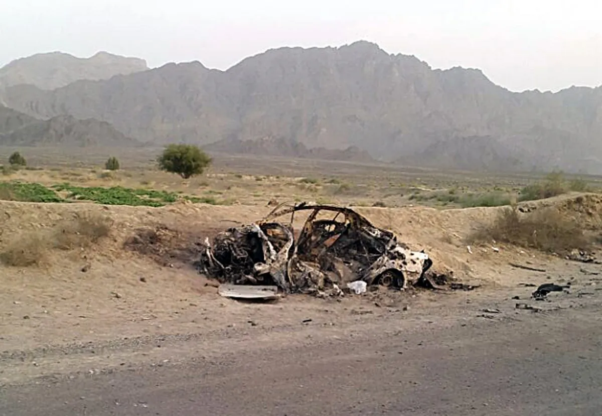 The scene of the U.S. drone strike said to have killed the Taliban leader Mullah Akhtar Mohammad Mansoor on May 22, 2016, while he was traveling in the Ahmad Wal area in Baluchistan Province, Pakistan, near Afghanistan's border. (AP Photo/Abdul Salam Khan)