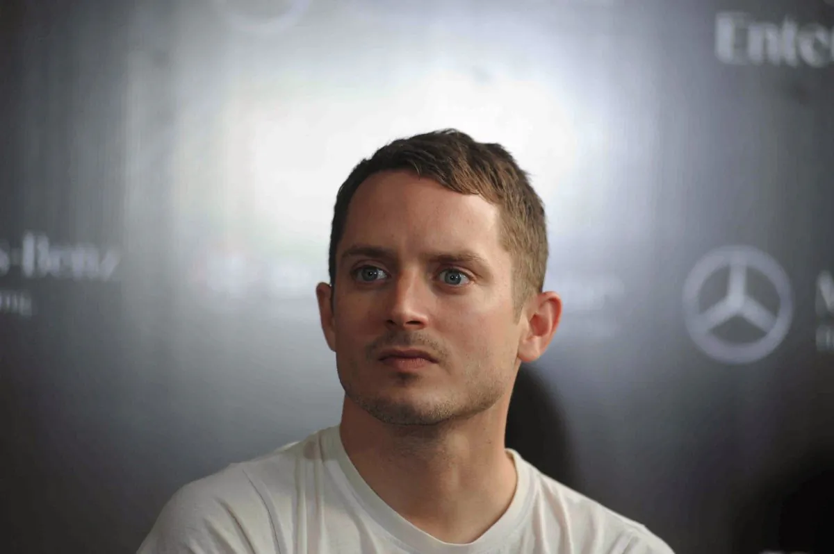 US actor Elijah Wood attends a press conference in Mumbai on September 3, 2015. Woods, who is also a DJ, is in India on a tour with his group Wooden Wisdom with fellow DJ Zach Cowie. AFP PHOTO (Photo credit should read STR/AFP/Getty Images)