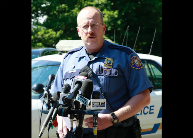 Portland police officer Larry O'Dea speaks during a news conference after remains were found in a search in Portland, Ore. on Friday July 15, 2011. (AP Photo/Rick Bowmer)