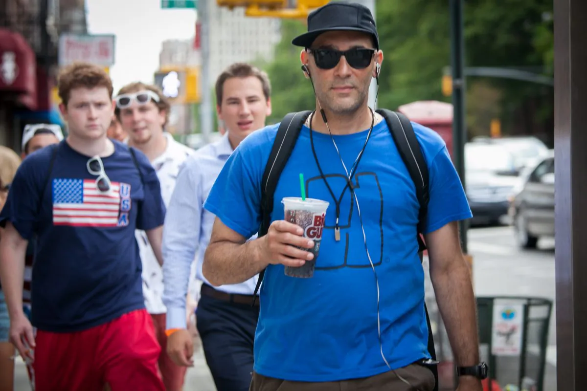 A man drinks a Big Gulp drink from 7-Eleven, in Manhattan, on June 26, 2014. Soda is one of the biggest sources of added sugars in the American diet. (Samira Bouaou/Epoch Times)