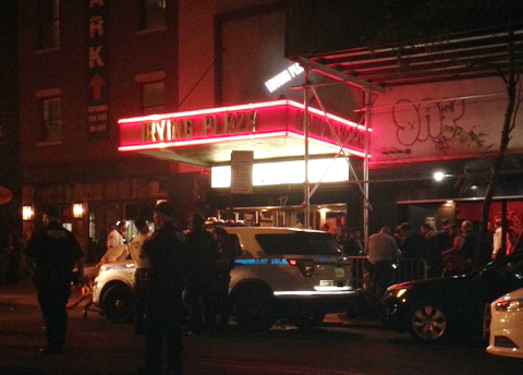 Authorities stand outside Irving Plaza, near Manhattan's Union Square in New York after a shooting Wednesday, May 25, 2016. Police say several were injured in a deadly shooting inside the concert venue, where hip-hop artist T.I. was scheduled to perform. (AP Photo/Dana Schimmel)