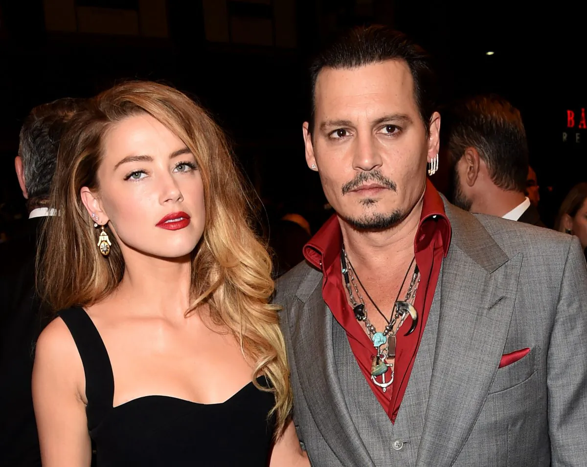 Actors Amber Heard (L) and Johnny Depp attend the "Black Mass" premiere during the 2015 Toronto International Film Festival at The Elgin on Sept. 14, 2015 in Toronto. (Jason Merritt/Getty Images)