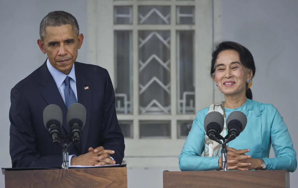 President Barack Obama (L) and then opposition leader, now Burma State Counselor and Foreign Minister Aung San Suu Kyi (R) in a press conference at her residence in Yangon on Nov. 14, 2014. (Mandel Ngan/AFP/Getty Images)