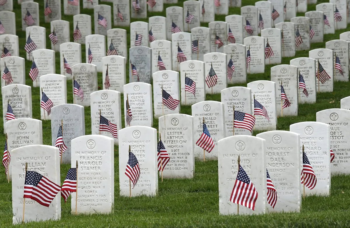 American flags at the graves of U.S. soldiers buried at Arlington National Cemetery, in preparation for Memorial Day in Arlington, Va., on May 21, 2015. (Win McNamee/Getty Images)