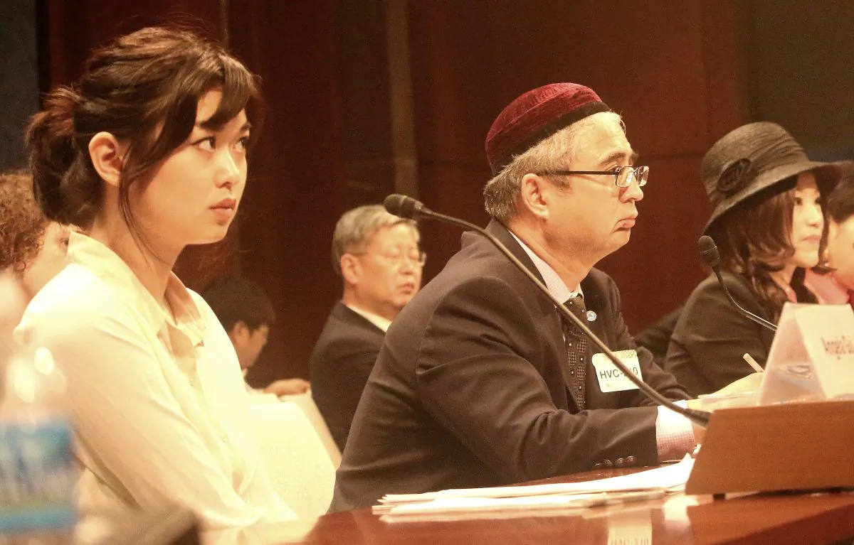 (L to R) Angela Gui, daughter of disappeared Hong Kong bookseller Gui Minhai; Ilshat Hassan, president, Uyghur American Association; and Su Yutong, journalist and internet activist, testify May 24, at the Congressional-Executive Commission on China on China's global efforts to silence critics. (Gary Feuerberg/ Epoch Times)