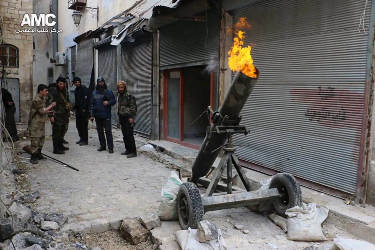 In this Sunday Feb. 15, 2015 photo shows Syrian rebels firing locally made shells against the Syrian government forces, in Aleppo, Syria. (AP Photo/Aleppo Media Center, AMC)