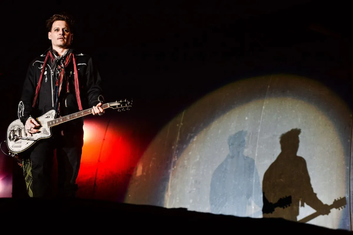 Johnny Depp, guitarist of US band Hollywood Vampires, performs at the Rock in Rio Lisboa music festival at Bela Vista Park in Lisbon on May 27, 2016. Rock in Rio runs from May 19 to May 29, 2016.  / AFP / PATRICIA DE MELO MOREIRA        (Photo credit should read PATRICIA DE MELO MOREIRA/AFP/Getty Images)