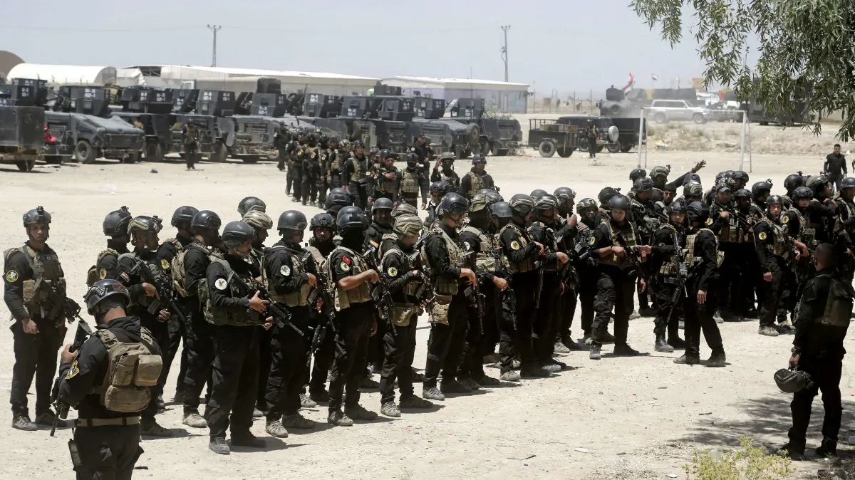 Iraq's elite counterterrorism forces gather ahead of an operation to retake ISIS-held city of Fallujah, Iraq, on May 29, 2016. (AP Photo/Khalid Mohammed)