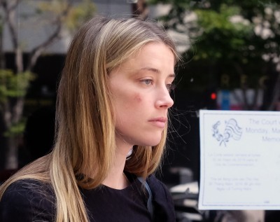 Actress Amber Heard leaves Los Angeles Superior Court court on Friday, May 27, 2016. (AP Photo/Richard Vogel)