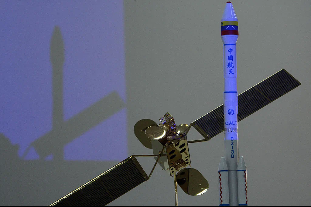Scale models of the Venezuelan satellite and its Chinese launcher on display at Venezuela's satellite control center at El Sombrero, Venezuela on Oct. 28, 2008. The Chinese regime launched its new ZiYuan-3 spy satellite on March 30. (Thomas Coex/AFP/Getty Images)