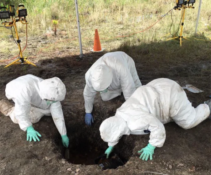 Todd's remains were containerized in a fluid substance suspected to be some form of acid. Hazmat crews seen here worked tirelessly for 48-hours to recover her body. (Martin County Sheriff's Office photo)