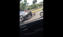 Caught on Video: Car Driver Gets Into Fight With Motorcyclist, Runs Him Over