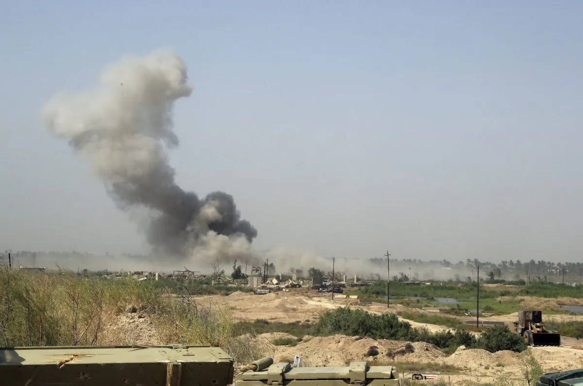 Smoke rises from Islamic State group positions after an airstrike by U.S.-led coalition warplanes as Iraqi counterterrorism forces face off with Islamic State militants in the Nuaimiya neighborhood of Fallujah, Iraq, Wednesday, June 1, 2016. The U.N. children's fund has issued a stark warning to Iraqi troops and Islamic State militants to spare the children amid a battle to retake the city of Fallujah city. UNICEF says it's concerned for the safety of an estimated of 20,000 children trapped inside this city west of Baghdad as very few families have managed to flee Fallujah since the offensive started more than a week ago. (AP Photo/Khalid Mohammed)