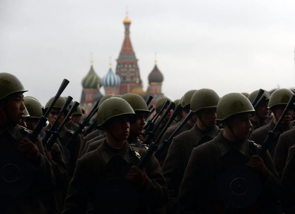 Wearing the WWII-era Red Army uniform Russian soldiers stand at the Red Square in Moscow, on Nov. 5, 2013, during a rehearsal for a military parade. (Vasily Maximov/AFP/Getty Images)