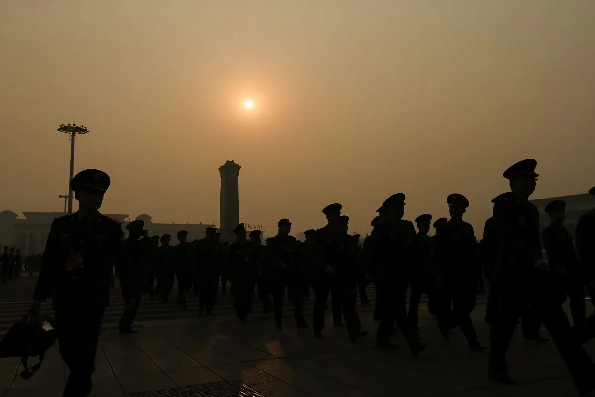 Chinese military delegates arrive at the Great Hall of the People before the closing session of the National People's Congress on March 16, 2016 in Beijing, China. (Lintao Zhang/Getty Images)