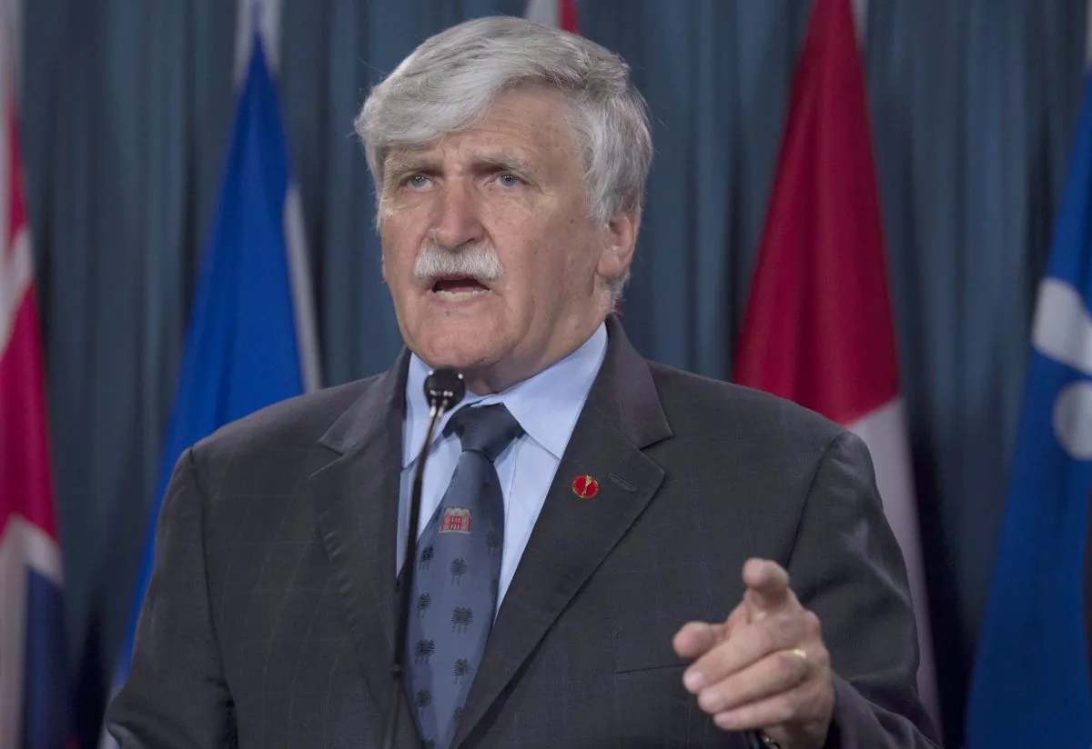 Former senator Romeo Dallaire speaks about torture in Syria during a news conference on Parliament Hill on May 31, 2016. (The Canadian Press/Adrian Wyld)