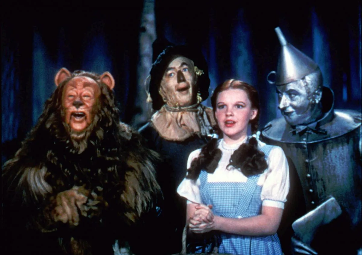FILE - In this 1939 file photo originally released by Warner Bros., from left, Bert Lahr as the Cowardly Lion, Ray Bolger as the Scarecrow, Judy Garland as Dorothy, and Jack Haley as the Tin Woodman, are shown in a scene from "The Wizard of Oz." (AP Photo/Warner Bros., file)