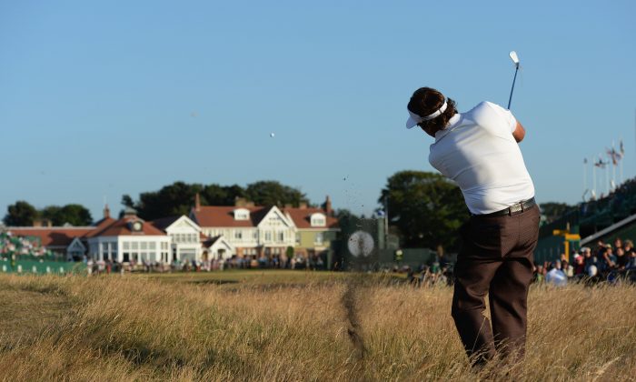 Phil Mickelson  hits a shot on the 18th during the second round of the 142nd Open Championship at Muirfield on July 19, 2013 in Gullane, Scotland. (Stuart Franklin/Getty Images) 