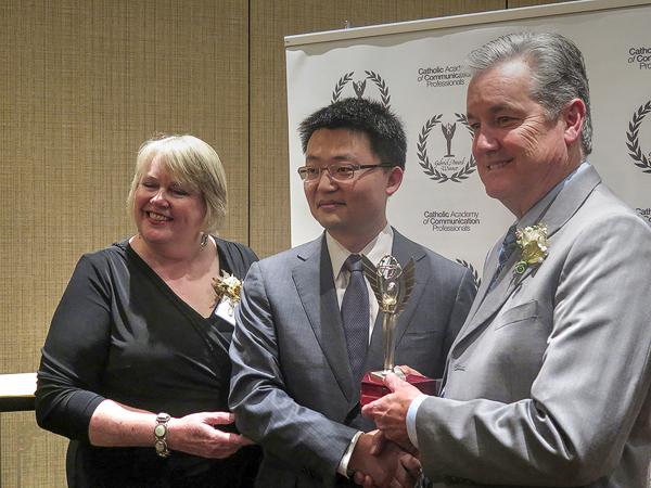 (L–R) Susan-Wallace, awards chair, Leon-Lee, director of "The Bleeding Edge," and David Hains, president of the Catholic Academy, at the Gabriel Awards. (Joyce-Mitchell/ Epoch-Times)