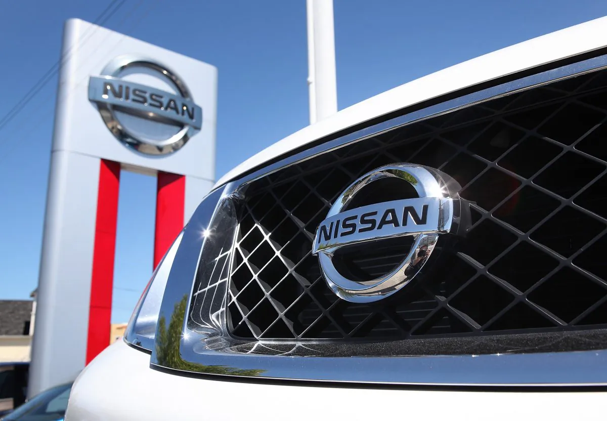 The Nissan logo is seen on the front of a brand new Nissan SUV at a Nissan dealership in Millbrae, Calif., on May 12, 2011. (Justin Sullivan/Getty Images)