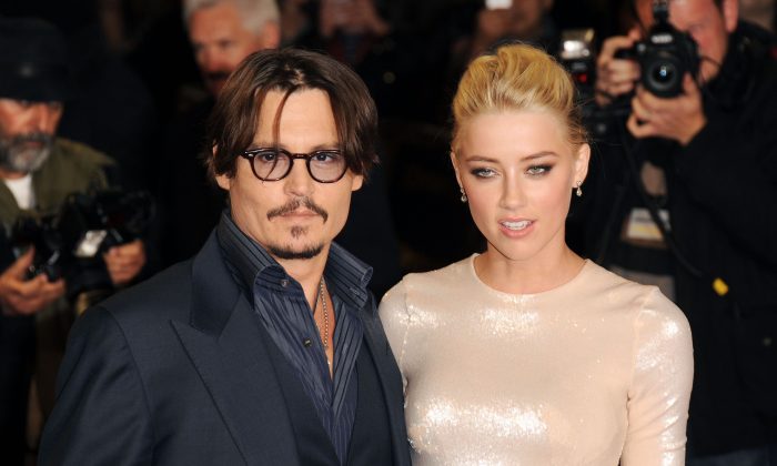 Johnny Depp and Amber Heard attend The UK Premiere of 'The Rum Diary' at  on November 3, 2011 in London, England. (Stuart Wilson/Getty Images)