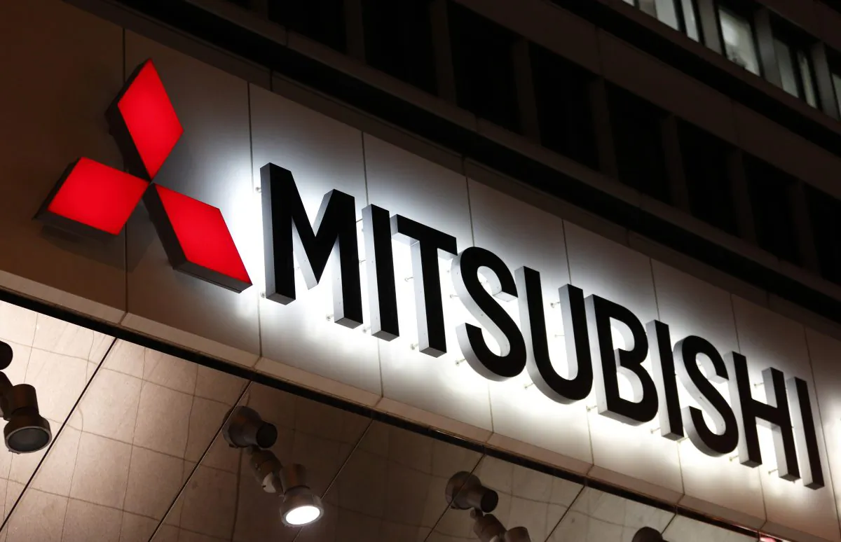 The Mitsubishi Motors logo is displayed outside the company's headquarters in Tokyo on April 20, 2016. (Tomohiro Ohsumi/Getty Images)
