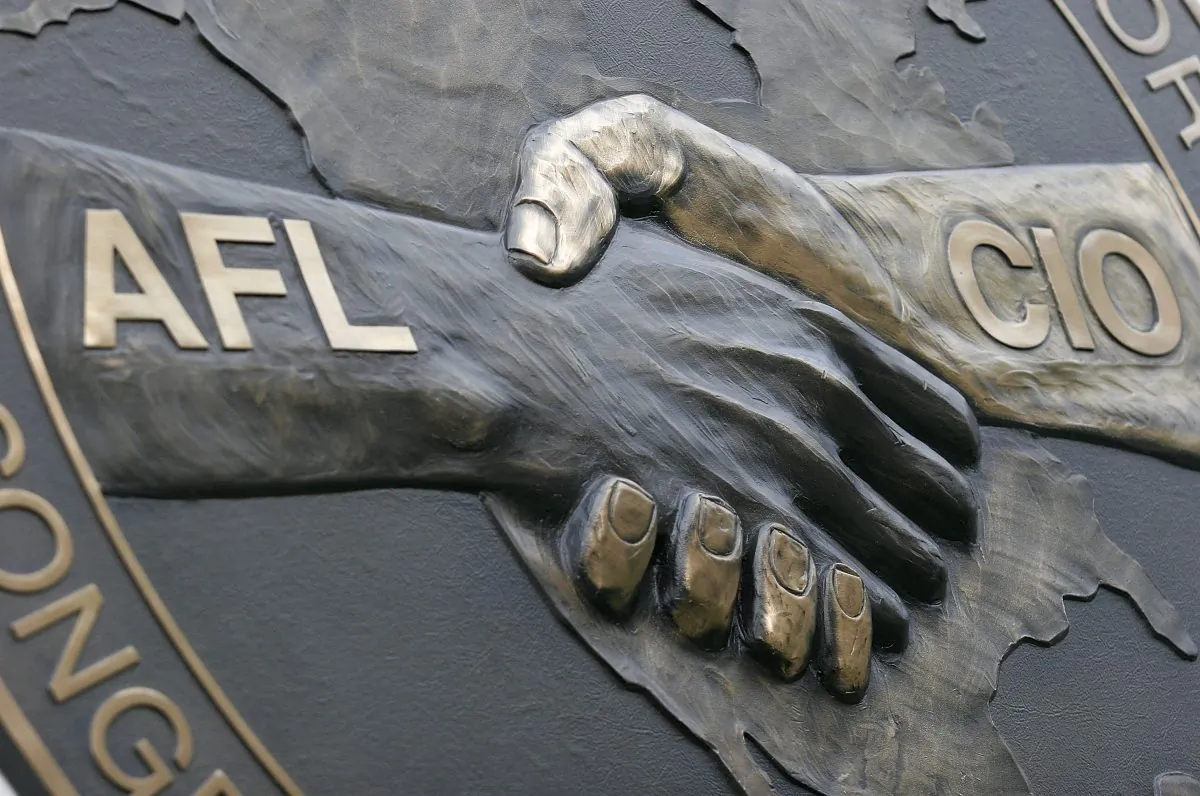 American Federation of Labor and Congress of Industrial Organizations (AFL–CIO) signage on the building at the intersection of 16th Street NW and Eye Street, just two blocks north of the White House, in Washington, D.C., on July 25, 2005. (Chip Somodevilla/Getty Images)