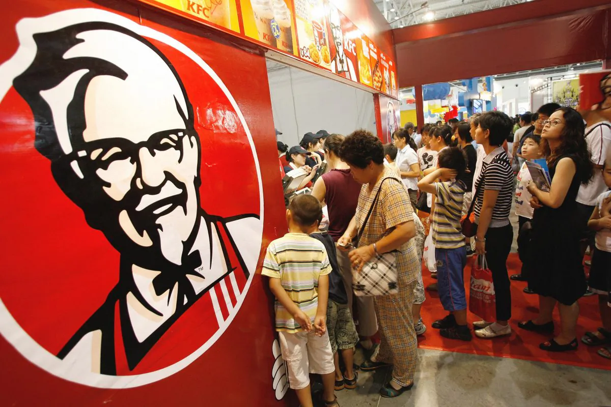 Customers line up to buy Kentucky Fried Chicken in Beijing on July 26, 2007. (Teh Eng Koon/AFP/Getty Images)