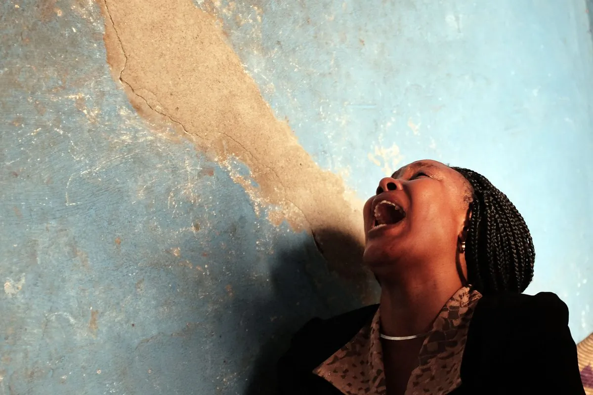 A relative of a man who was killed by police the previous evening grieves in Bujumbura, Burundi, on June 28, 2015. (Spencer Platt/Getty Images)