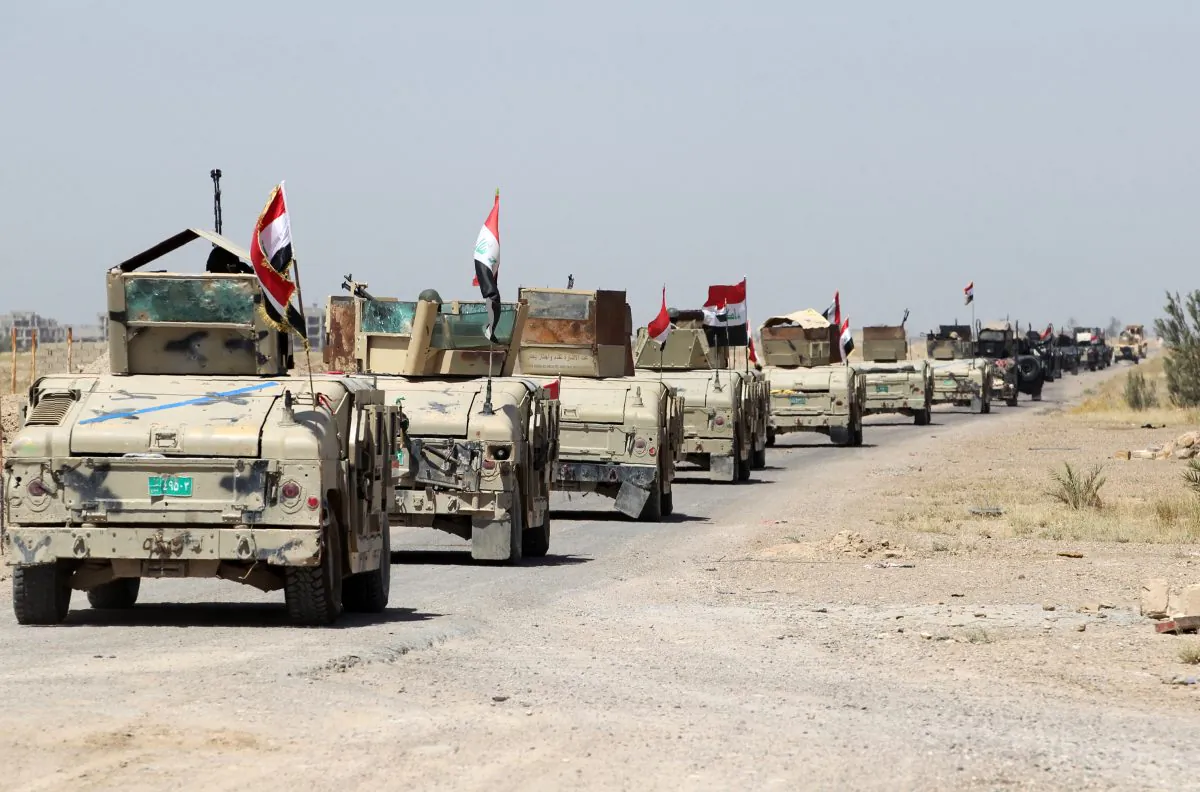 Iraqi government forces take a position outside al-Shuhada neighborhood, south of Fallujah, during an operation to regain control of the area from the Islamic State on June 3, 2016. (Ahmad al-Rubaye/AFP/Getty Images)