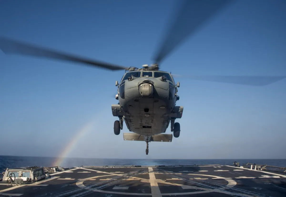 An MH-60R Sea Hawk helicopter of the Helicopter Maritime Squadron (HSM 37) lands on the flight deck of the guided-missile destroyer USS Chung-Hoon (DDG 93) on Feb. 23, 2016. (U.S. Navy/Mass Communication Specialist 2nd Class Marcus L. Stanley)