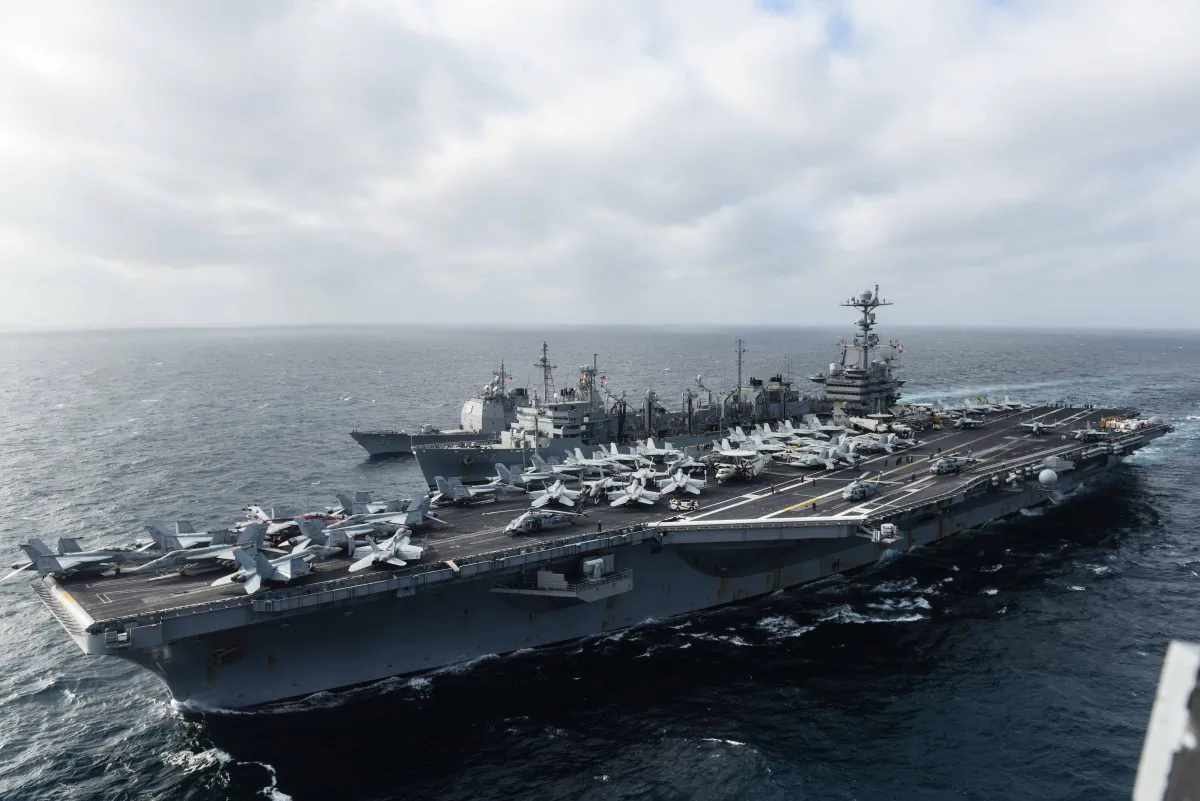 USS John C. Stennis (CVN 74) participates in a replenishment-at-sea with the fast combat support ship USNS Rainier (T-AOE 7) and the guided-missile cruiser USS Mobile Bay (CG 53) on March 4, 2016. Mobile Bay is receiving an advanced biofuel mixture from Rainier. (U.S. Navy/Mass Communication Specialist 2nd Class Andrew P. Holmes)
