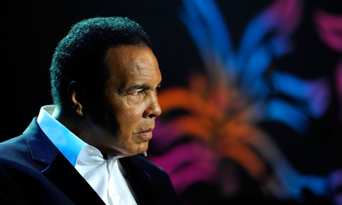 Muhammad Ali onstage during the Michael J. Fox Foundation's 2010 Benefit "A Funny Thing Happened on the Way to Cure Parkinson's" at The Waldorf=Astoria on November 13, 2010 in New York City.  (Photo by Andrew H. Walker/Getty Images for the Michael J. Fox Foundation for Parkinson's Research)