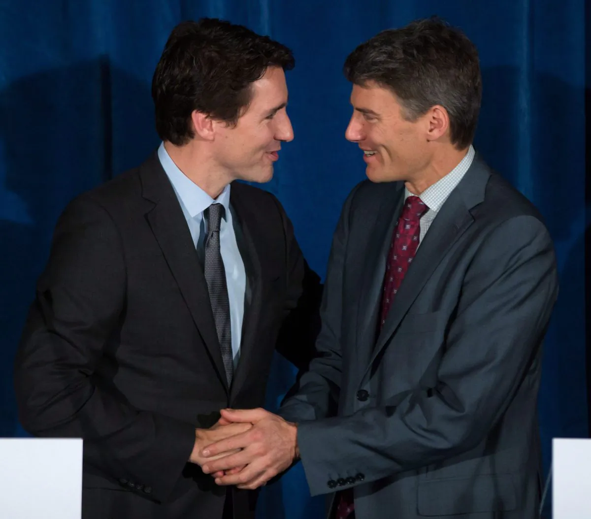 Prime Minister Justin Trudeau and Vancouver Mayor Gregor Robertson shake hands after a news conference in Vancouver on Dec. 17, 2015.  (The Canadian Press/Darryl Dyck)
