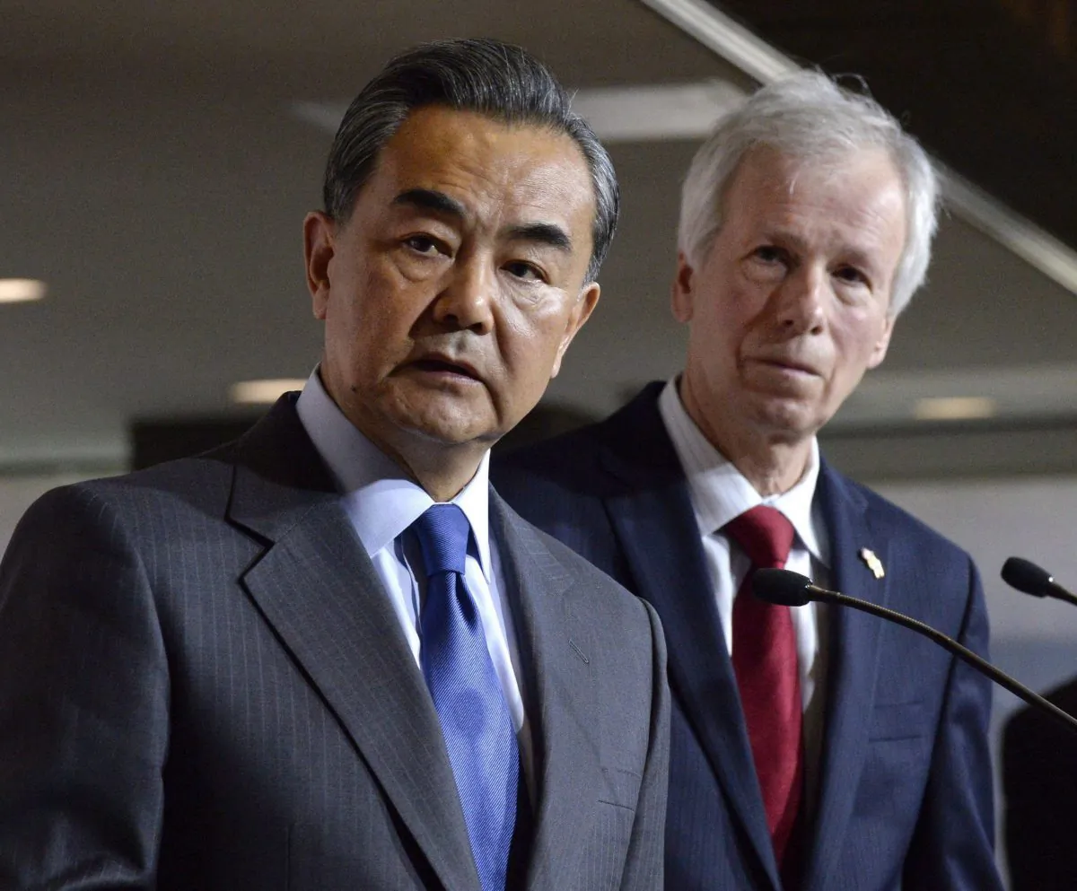 China's Minister of Foreign Affairs Wang Yi and Foreign Affairs Minister Stephane Dion participate in a press conference on June 1, 2016, in Ottawa. (The Canadian Press/Justin Tang)