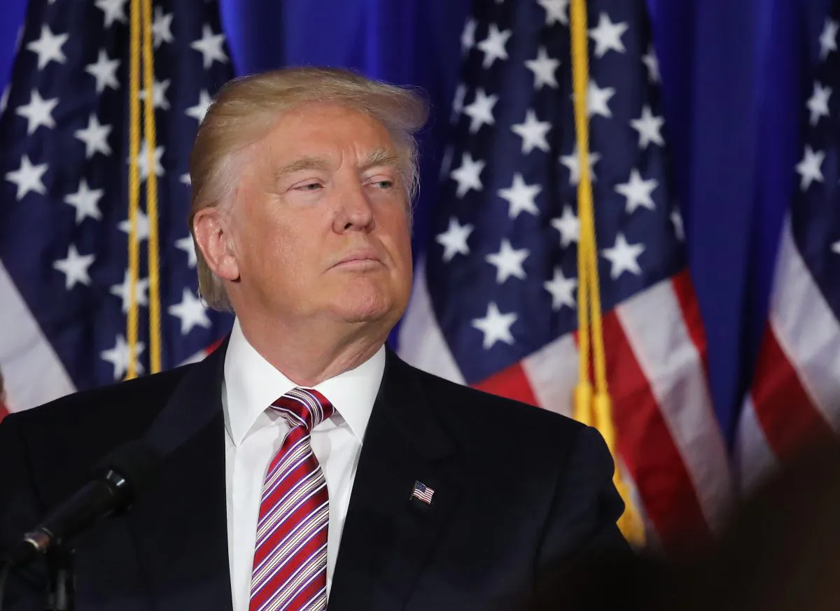 U.S. Republican Presidential candidate Donald Trump addresses supporters and the media following primary elections on June 7, 2016 in Briarcliff Manor, New York. (Photo by John Moore/Getty Images)
