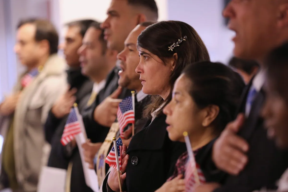 Immigrants take oath of citizenship to the United States in Newark, N.J., on Nov. 20, 2014. (John Moore/Getty Images)