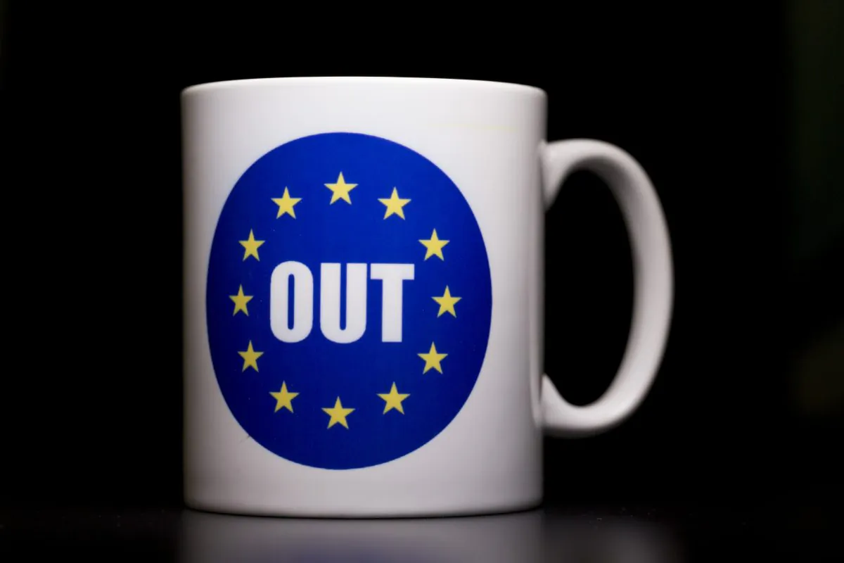 The word "OUT" is depicted on a mug in London, U.K., on March 17, 2016. The United Kingdom will hold a referendum on June 23, 2016 to decide whether or not to remain a member of the European Union. (Dan Kitwood/Getty Images)