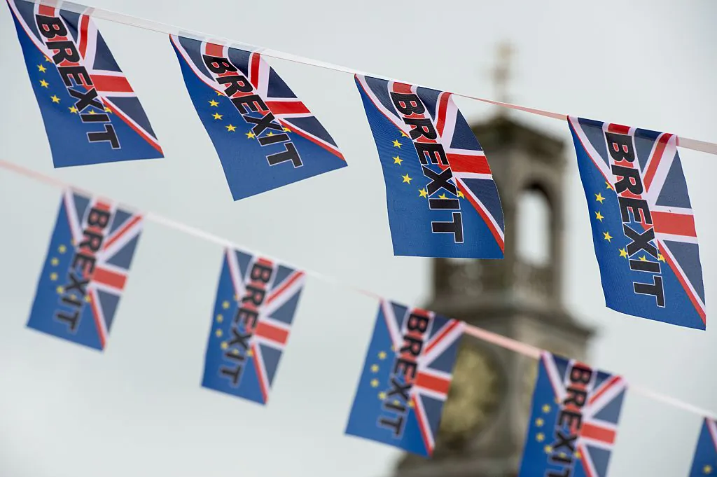 Pro-Brexit flags fly from a fishing boat moored in Ramsgate on June 13, 2016. (Chris J Ratcliffe/AFP/Getty Images)