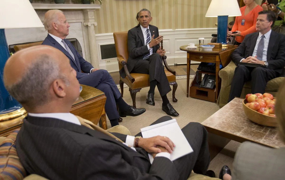 President Barack Obama, center, speaks to members of the media in the Oval Office of the White House in Washington, Monday, June 13, 2016, after getting briefed on the investigation of a shooting at a nightclub in Orlando by FBI Director James Comey, right, Homeland Security Secretary Jeh Johnson, left, and Vice President Joe Biden. (AP Photo/Pablo Martinez Monsivais)