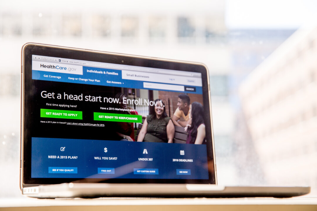The HealthCare.gov website, where people can buy health insurance, is displayed on a laptop screen in Washington, D.C., on Oct. 6, 2015. (AP Photo/Andrew Harnik)
