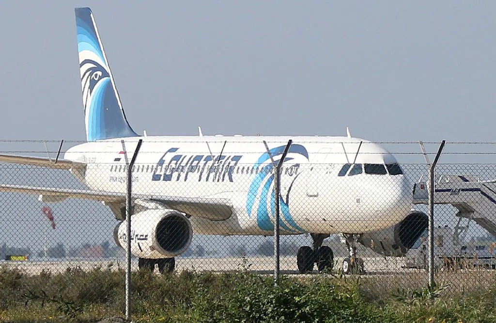An EgyptAir Airbus A-320 sits on the tarmac of Larnaca airport after it was hijacked and diverted to Cyprus on March 29, 2016. (STR/AFP/Getty Images)