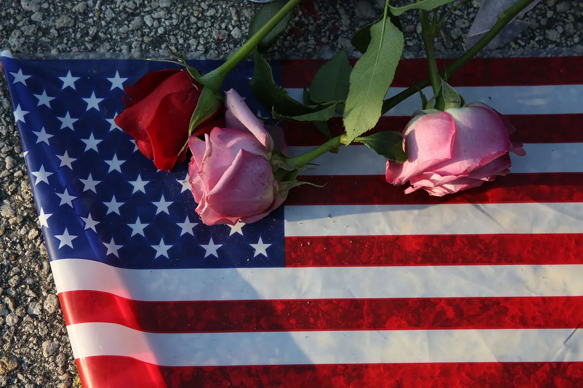 Flowers and an American flag in Orlando, Florida., on June 13, 2016. (Joe Raedle/Getty Images)